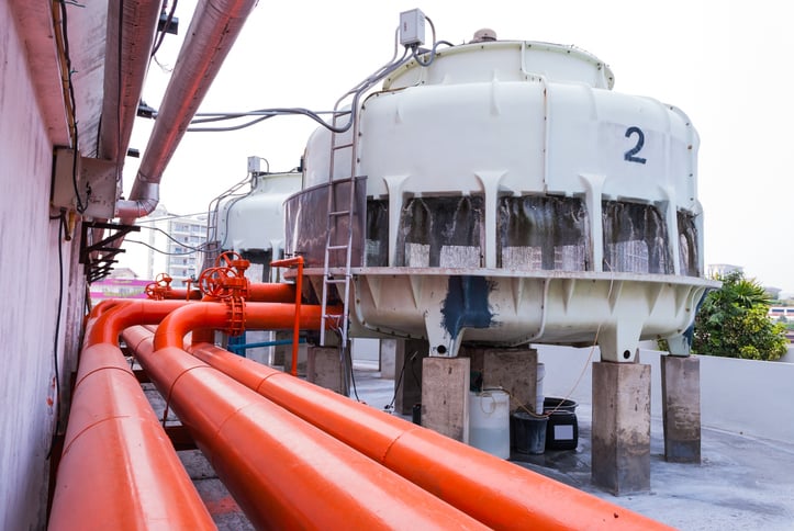 Cooling tower with orange pipes